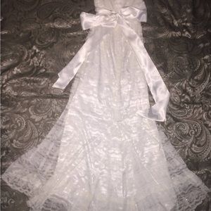 Size 4 ivory Galina wedding gown with overlay tulle.